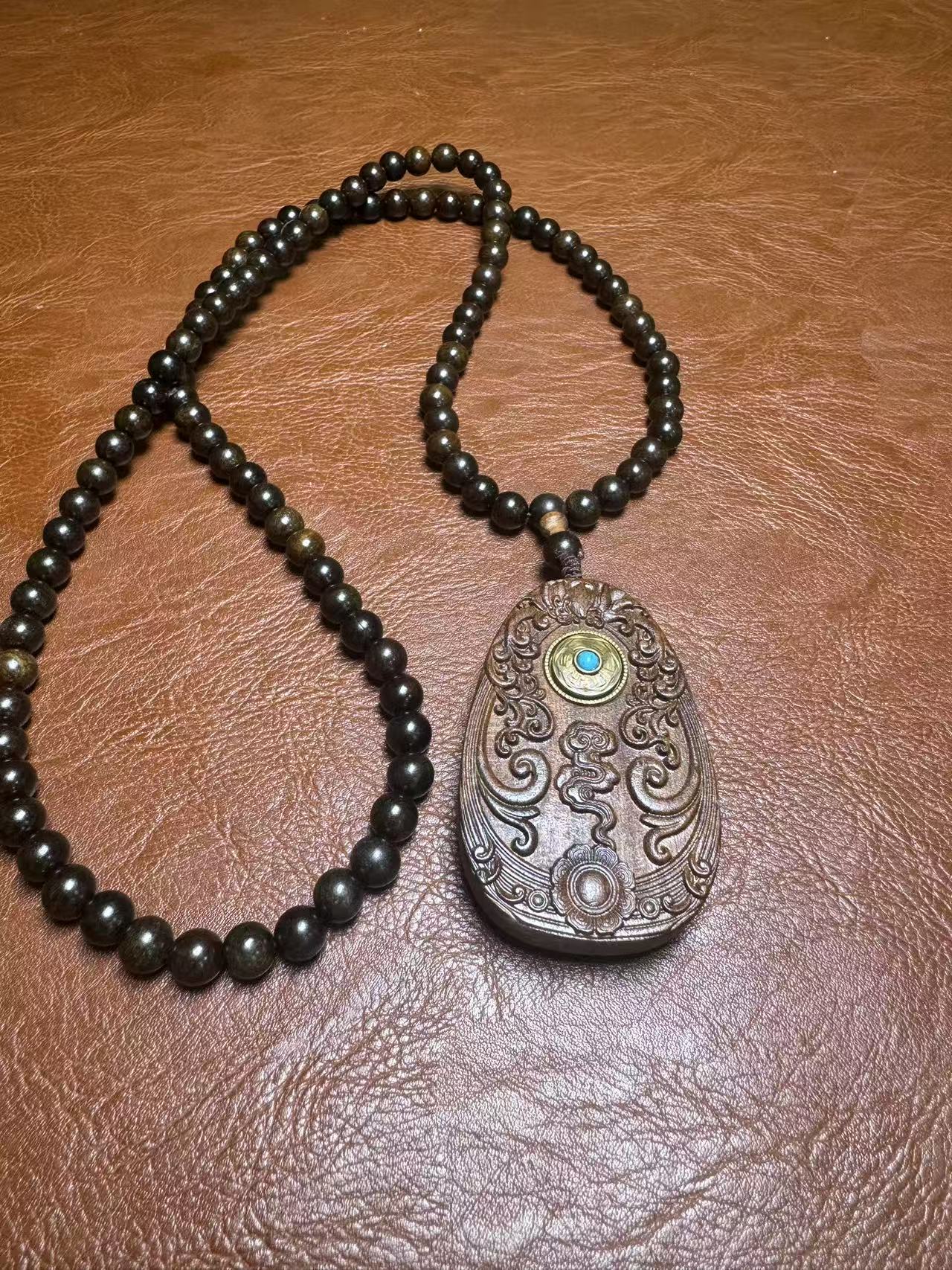 E28 Bracelet Yellow Pear Wood Pendant